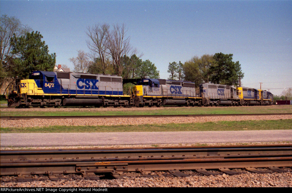 CSX8472 leads 3 other SD40-2's and a U boat down track 1 towards West Hamlet